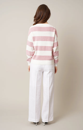 Model is wearing the striped waffle dolman by Cyrus in Pinkesque/Bone/Deluxe