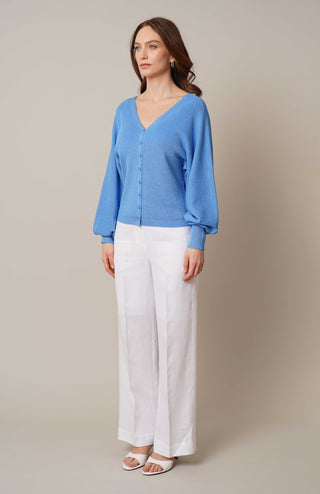 Model is wearing the v neck pullover cardigan by Cyrus in Azure Blue