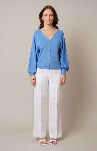 Model is wearing the v neck pullover cardigan by Cyrus in Azure Blue