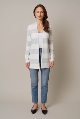 Model is wearing the striped waffle cardigan by Cyrus in Bone/Silver Heather Grey