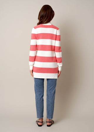 Model is wearing the striped waffle cardigan by Cyrus in Bone/Tea Rose