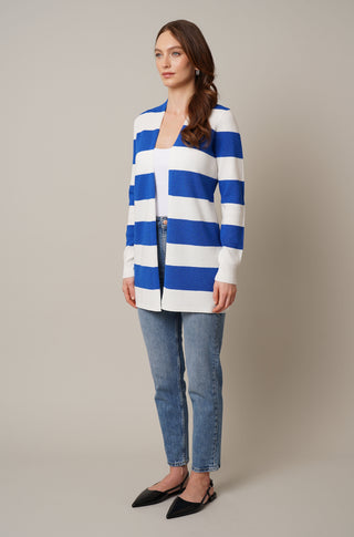 Model is wearing the striped waffle cardigan by Cyrus in Bone/Victoria Blue