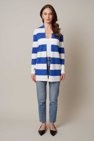 Model is wearing the striped waffle cardigan by Cyrus in Bone/Victoria Blue