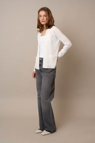 Model is wearing the Waffle Cardigan with Pockets by Cyrus in White