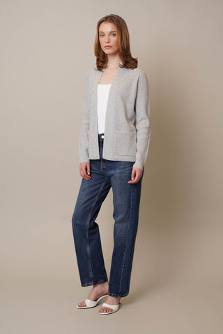 Model is wearing the Waffle Cardigan with Pockets by Cyrus in Grey Goose Heather