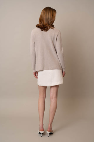 Model is wearing the Waffle Cardigan with Pockets by Cyrus in Kitten Heather