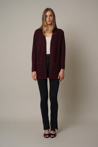 model wearing the Ottoman Stitch Open Cardigan by cyrus in barolo