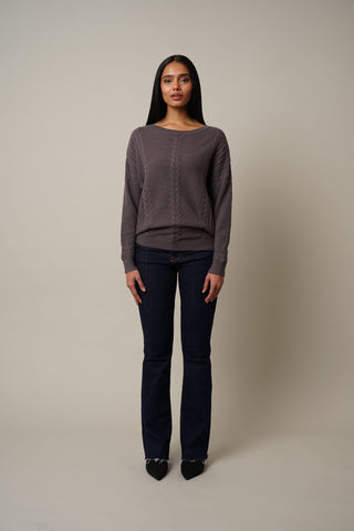 Model is wearing the Cable Knit Drop Shoulder Pullover in Grey Violet