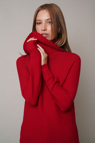 Model is wearing the Cowl Neck Ribbed Pulloverby Cyrus in Venetian Red