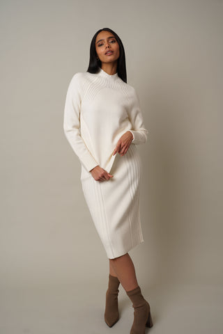 Model is wearing the Skirt with Ribs in Cream.