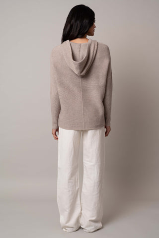 Model is wearing the ribbed-hoodie-pullover in Buckskin Heather