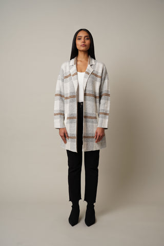 Model is wearing the Open Front Cardigan in Louis Plaid.