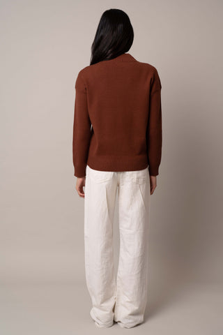 Model is wearing the mock-neck-pointelle-sweater in Havana Brown