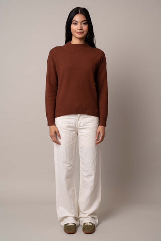 Model is wearing the mock-neck-pointelle-sweater in Havana Brown