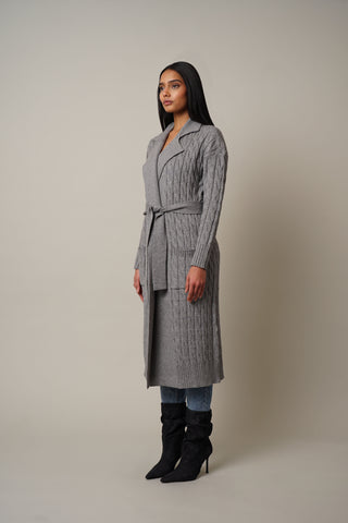 Model is wearing the Cable Knit Duster with Belt Tie in Medium Heather Grey.