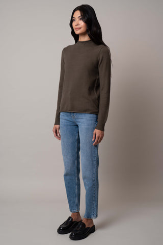 Model is wearing the funnel-neck-pullover in Burnt Olive Heather