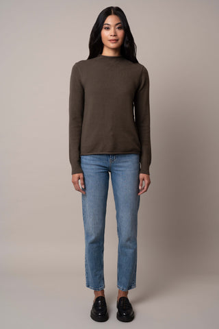 Model is wearing the funnel-neck-pullover in Burnt Olive Heather