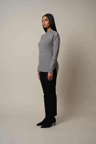 Model is wearing the Cable Knit Pullover with Buttons in Medium Heather Grey.