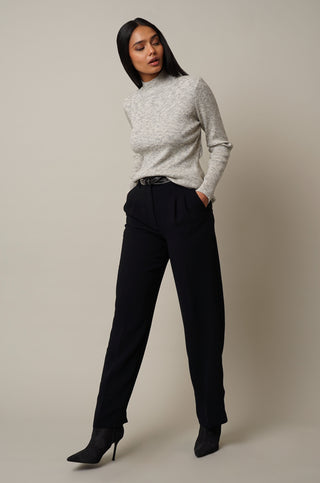 Model is wearing the Ribbed Funnel Neck Pullover in Merle Heather.