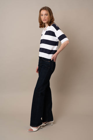 Model is wearing the Wide Stripe Short Sleeve Pullover by Cyrus in White/Eclipse