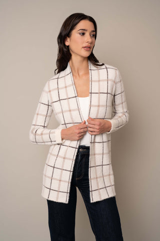 Model is wearing the Crystal Mink Cardigan in Woolworth Plaid.