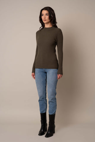 Model is wearing the Mock Neck Ribbed Pullover in Burnt Olive Heather.