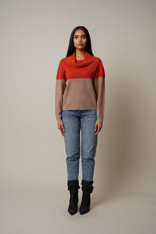 Model is wearing the Cowl Neck Dolman Pullover in Lantana Orange/Toffee.
