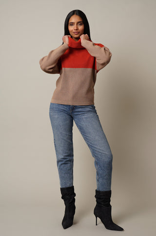 Model is wearing the Cowl Neck Dolman Pullover in Lantana Orange/Toffee.