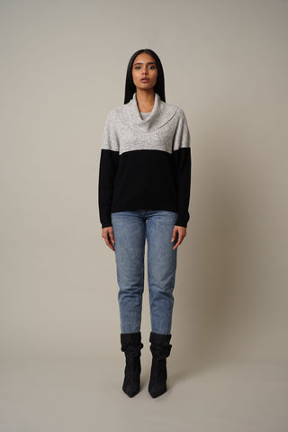 Model is wearing the Cowl Neck Dolman Pullover in Merle Heather/Black.
