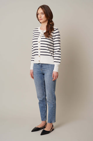 Model is wearing the striped button front cardigan by Cyrus in Bone/Eclipse