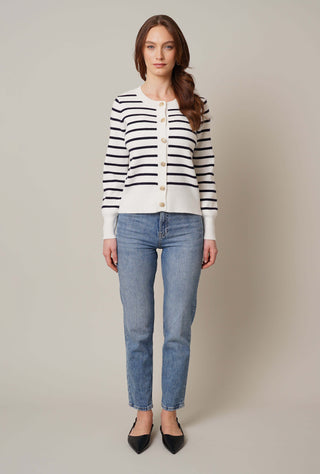 Model is wearing the striped button front cardigan by Cyrus in Bone/Eclipse