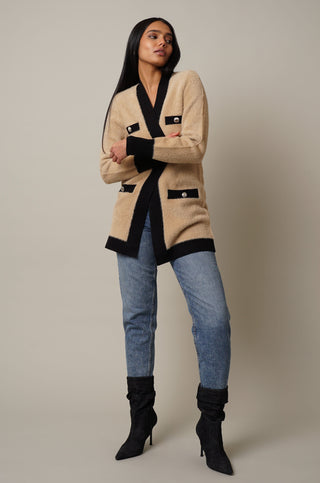 Model is wearing the Mink Open Cardigan with Trim in Camel/Black.