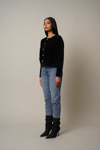 Model is wearing the Mink Button Front Cardigan in Black.