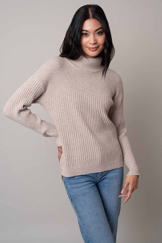 Model is wearing the wide-turtle-neck-pullover in Kitten Heather