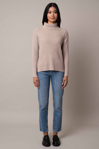 Model is wearing the wide-turtle-neck-pullover in Kitten Heather