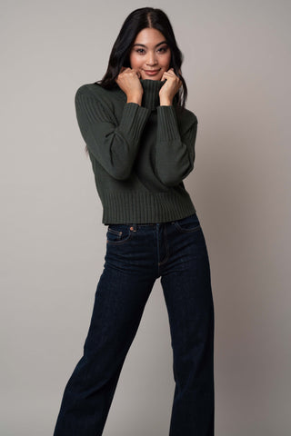 Model is wearing the cowl-neck-sweater-with-rib-trim in Forest Heather