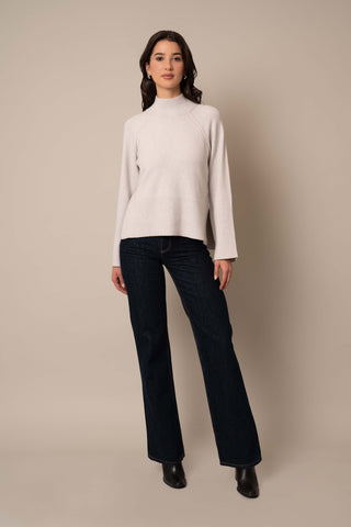 Model is wearing the Relaxed Mock Neck Sweater in Grey Goose Heather.