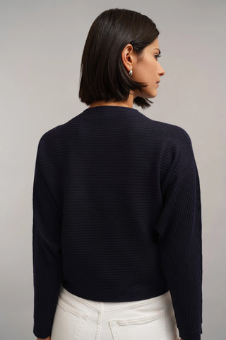 The Sculpted Rib Mock Neck Sweater
