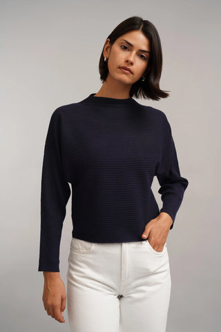 The Sculpted Rib Mock Neck Sweater