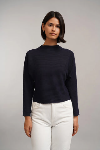 The Sculpted Rib Mock Neck Sweater