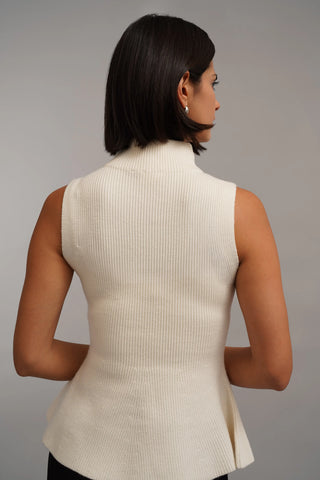 The Sculpted Peplum Turtleneck