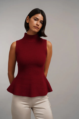 The Sculpted Peplum Turtleneck