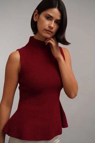 The Sculpted Peplum Turtleneck
