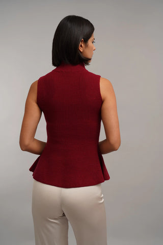 The Sculpted Peplum Turtleneck