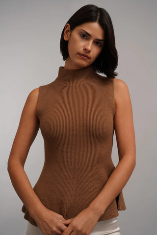 The Sculpted Peplum Turtleneck