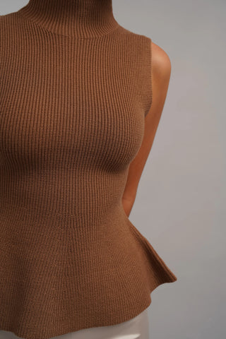 The Sculpted Peplum Turtleneck