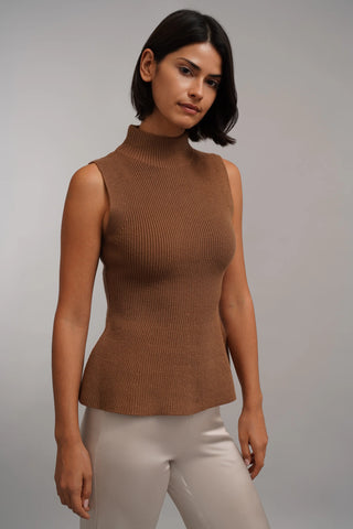 The Sculpted Peplum Turtleneck