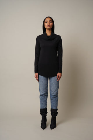Model is wearing the Waffled Cowl Neck Pullover in Black.