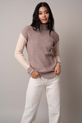 Model is wearing the two-tone-turtle-neck-pullover in Buckskin Heather/Bleached Sand