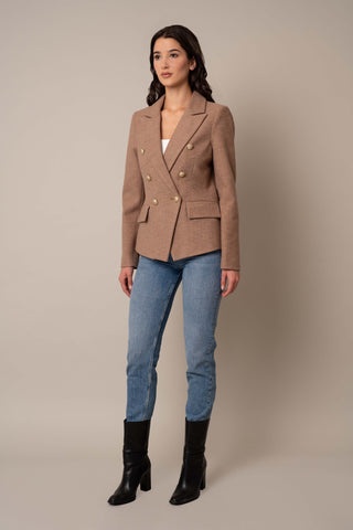 Model is wearing the Blazer With Pockets in Tan.